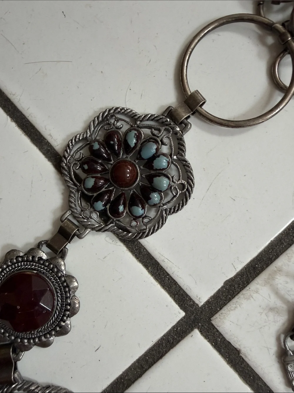 Silver tone Floral Link Belt with Garnet Accents